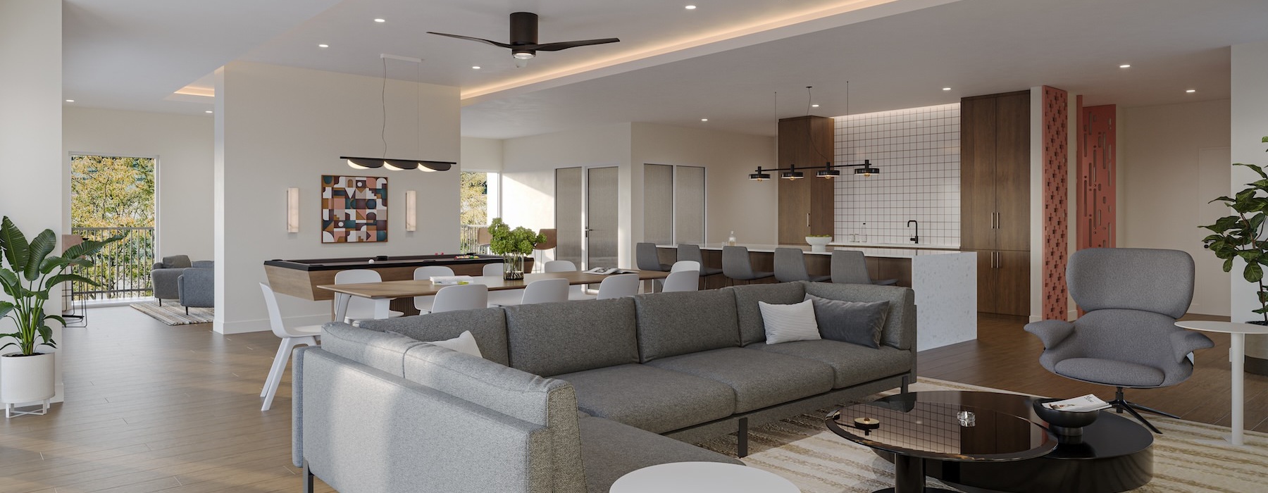a clubroom with a couch, tables and chairs